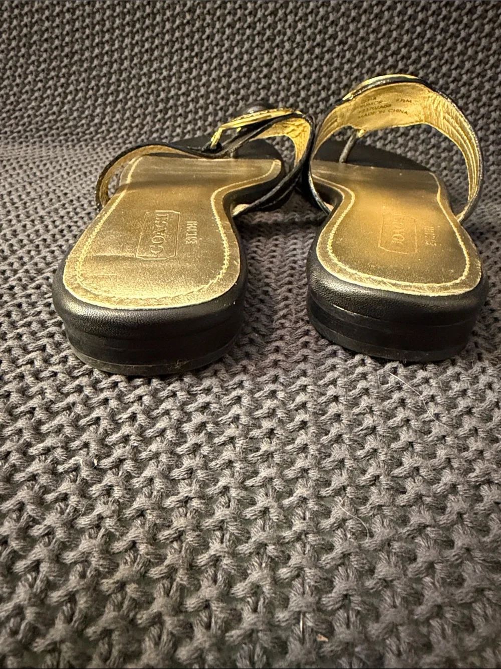 Coach Black Leather Thong Sandals with Gold Medallion